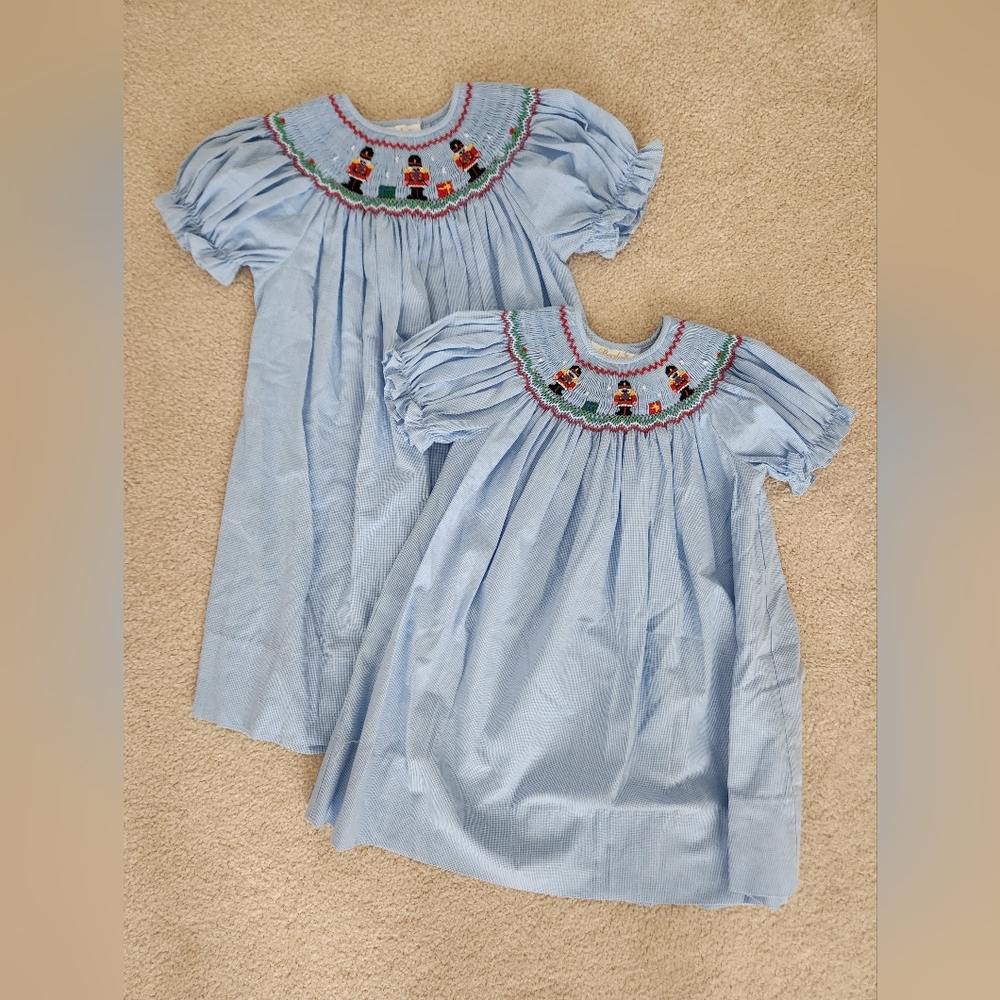 Rosalina smocked Nutcracker bishop dresses, size 12m and 2T.
